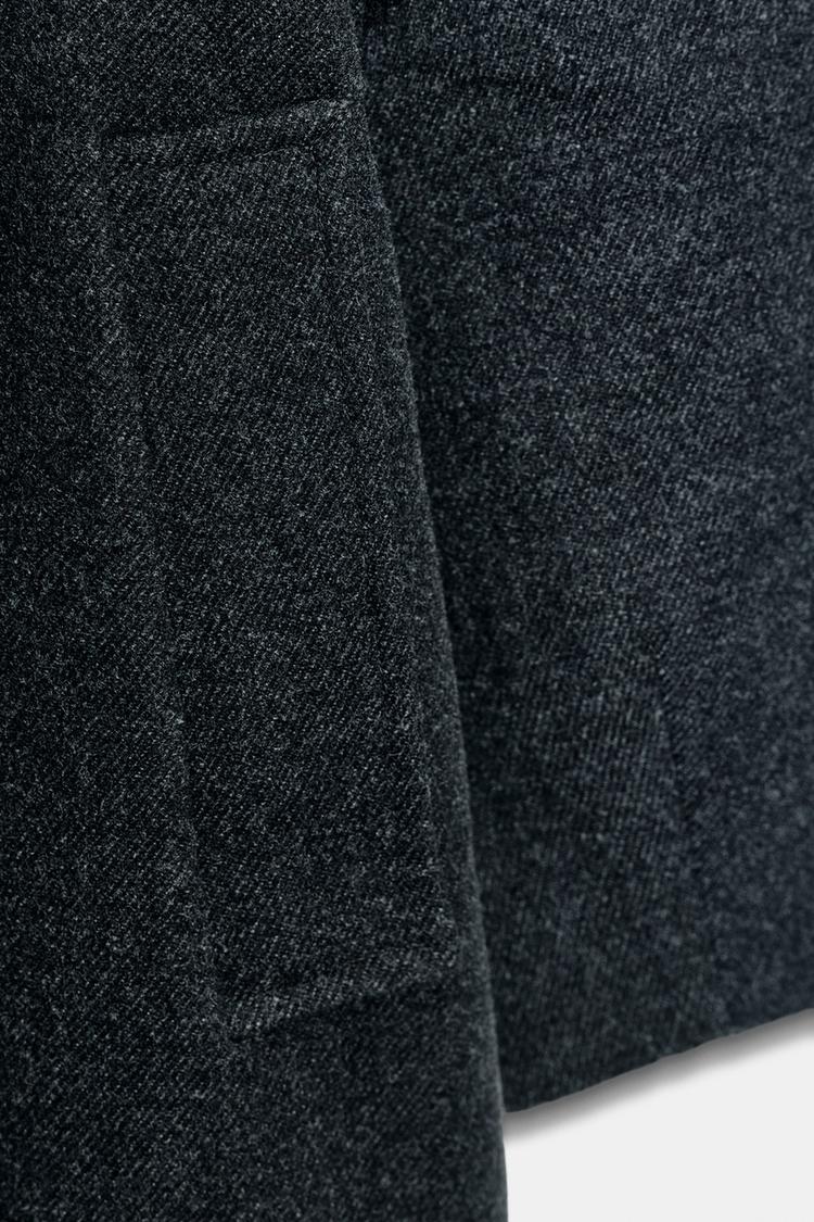 Soft belted coat with stand-up collar